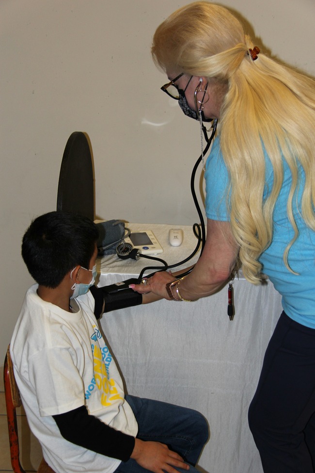 doctor treating a poor patient
